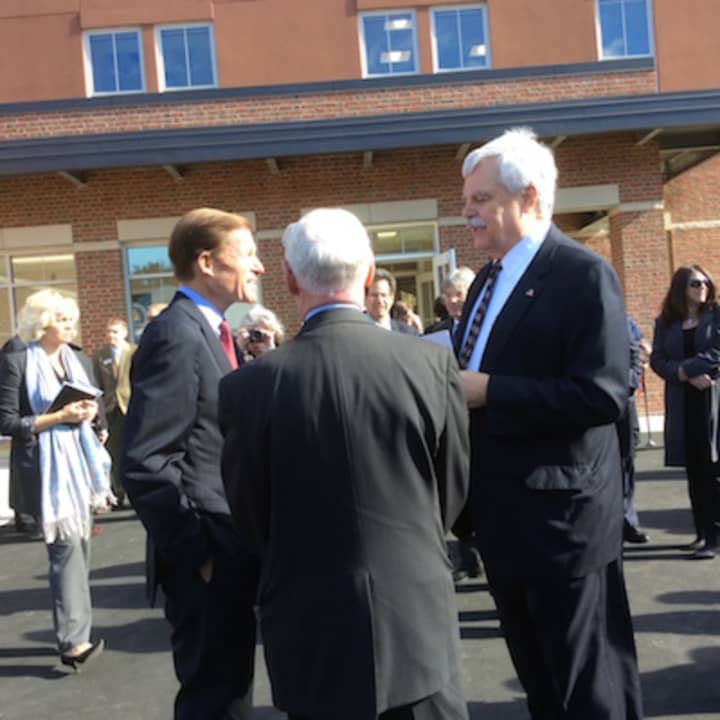 Sen. Richard Blumenthal and State Rep. Bob Godfrey chat outside the Greater Danbury Community Health Center on Main Street in Danbury. The new center was dedicated on Monday.