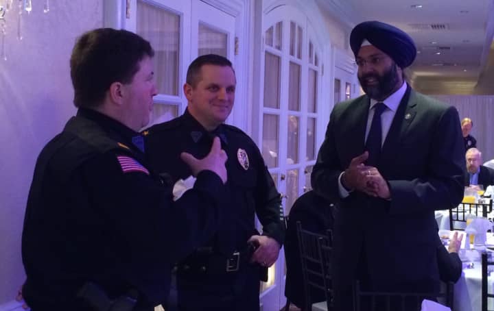 Acting Bergen County Prosecutor Gurbir S. Grewal speaks to police prior to a meeting of clergy and community leaders Friday morning in Wood-Ridge.