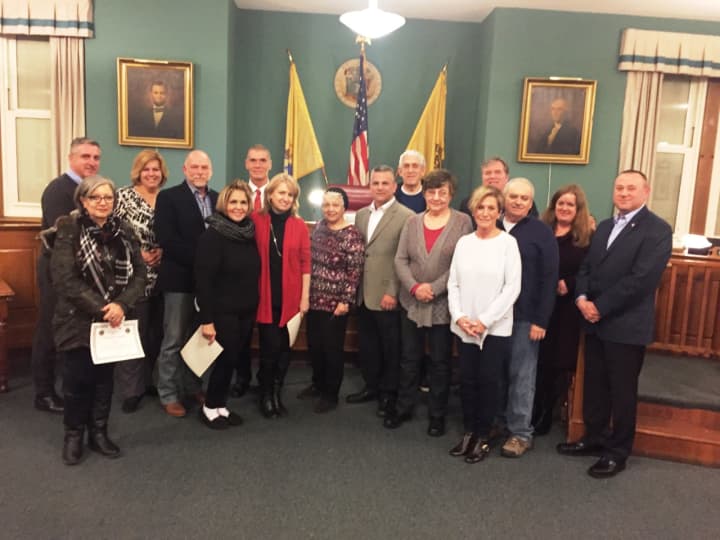 The Rutherford Mayor and Council, Lions Laura O&#x27;Connor and the 2015 Holiday decorating contest winners gathered after receiving the awards at the February Borough Meeting.