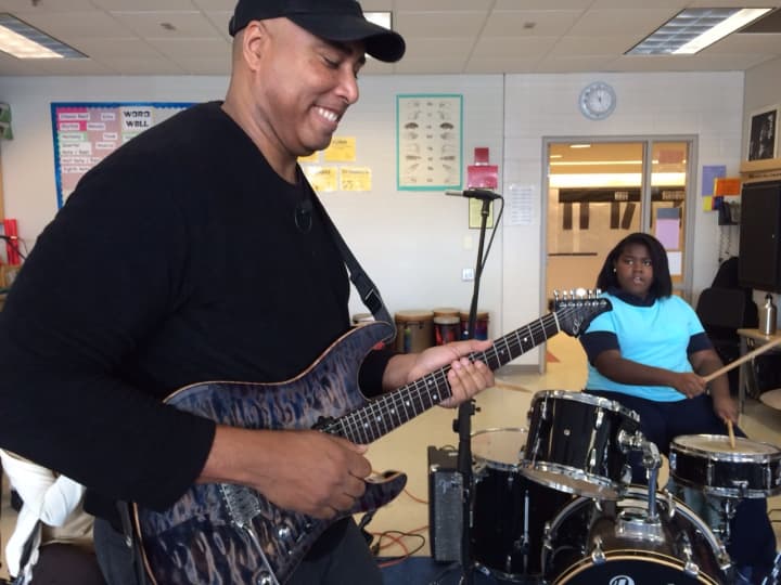 Yankees legend Bernie Williams jams with students at Tisdale School on March 7.