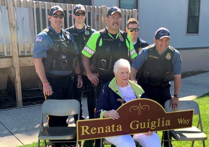 Renata is joined by (left to right) Officers Dan Hoffmann and John Gleason, Lt. Peter Mauro, Detective Gerry Powers and Capt. Joseph Rampolla