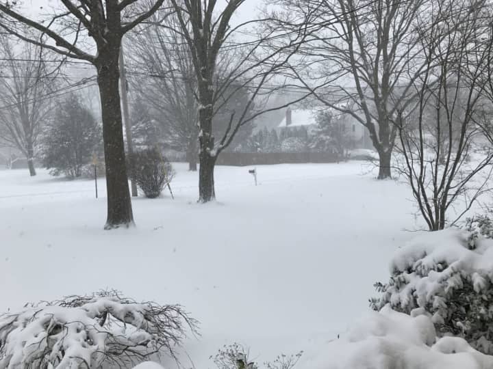 No one is venturing outside on a snowy Thursday morning in Southport. Over a foot of snow is forecast to fall by evening.