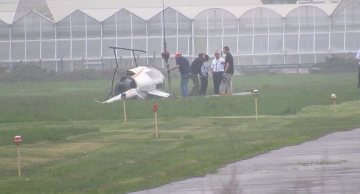 The pilot was performing maneuvers over a small grassy area when the tail rotor struck the ground at Lincoln Park Airport, rolling the copter onto its side, local police said.