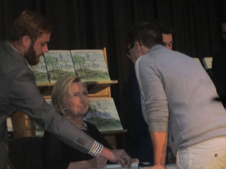 Hillary Clinton signs books at the Chappaqua Library.