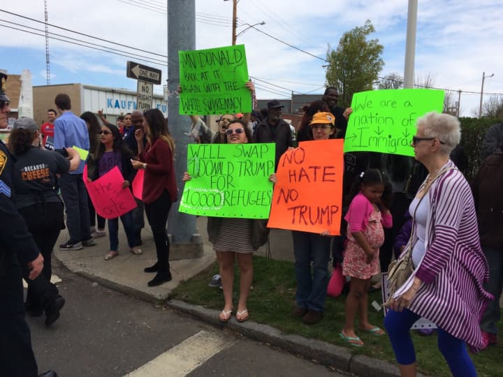 Protesters gather outside a Donald Trump rally at the Klein Memorial Auditorium in Bridgeport on Saturday.