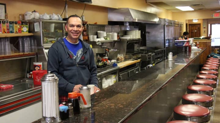 Fisher&#x27;s Cafe Owner Alex Reyes came from the Dominican Republic. He worked two jobs for several years before finally saving enough to buy his own place.