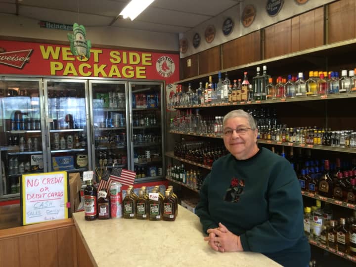 Theresa Valentino stands at the counter in West Side Package, a spot she&#x27;s known since 1968.