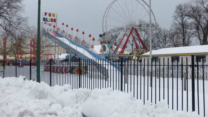 Rye Playland&#x27;s snow-coated &quot;Fun Slide&quot;   is on slippery grounds with a new review of the county contract with Standard Amusements.