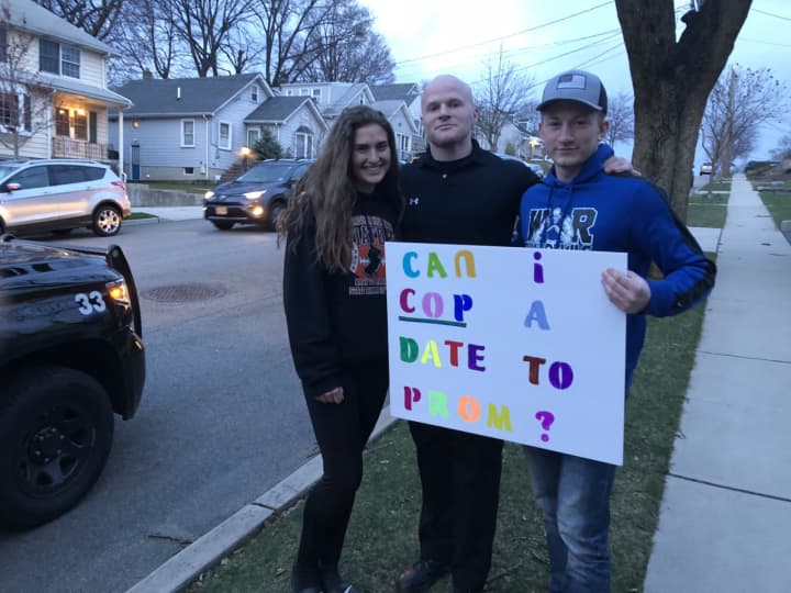 Julia and Jake with Wood-Ridge officer Tim Janz. &quot;Can I Cop A Date To Prom?&quot;