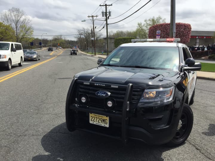 Police close off traffic on the Anderson Street Bridge in Hackensack leading into Teaneck.
