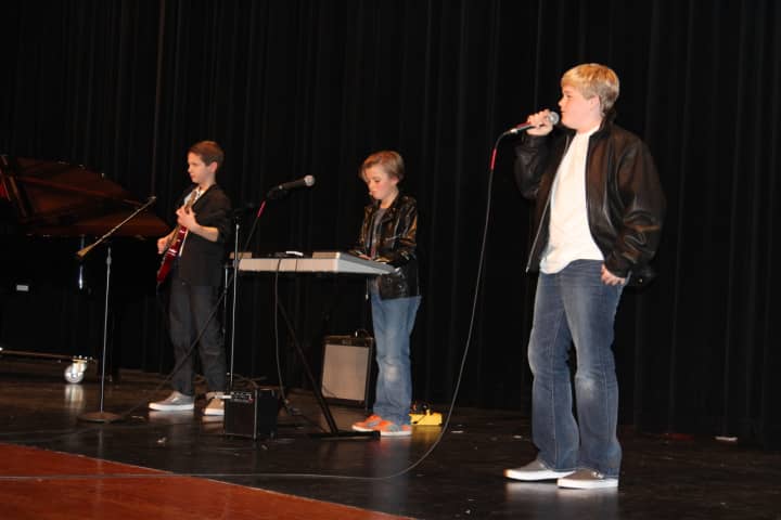 &quot;Take 3&quot; sang and played by the Rolling Stones&#x27; &quot;Satisfaction.&quot; Pictured left to right are Robert MacLehose, Cian LeVine and James Thom.