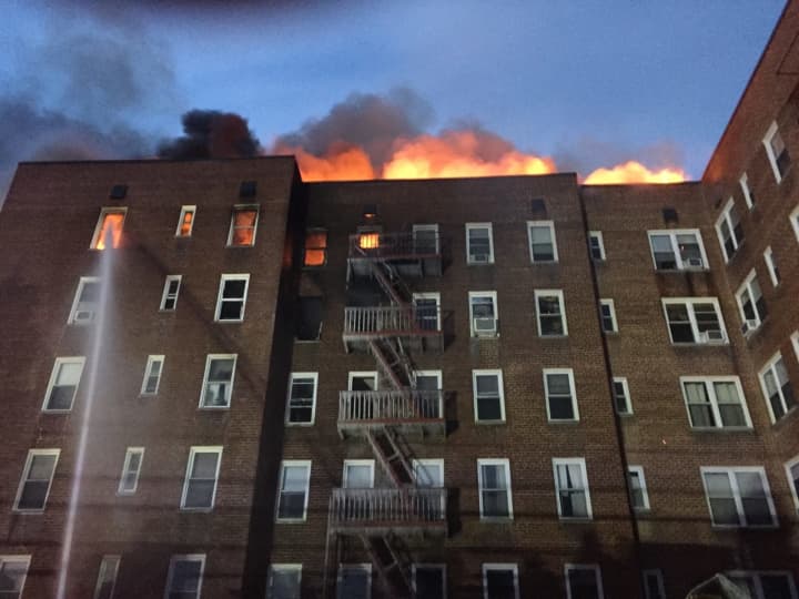 The fire broke out in the upper floors of the apartment complex at 1 Hawley Terrace, off Warburton Avenue, and spread through the roof.