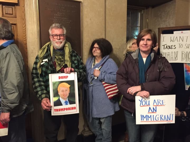 Members of Indivisible Westchester at Monday night&#x27;s &quot;Ask Astorino&quot; Town Hall meeting in White Plains.