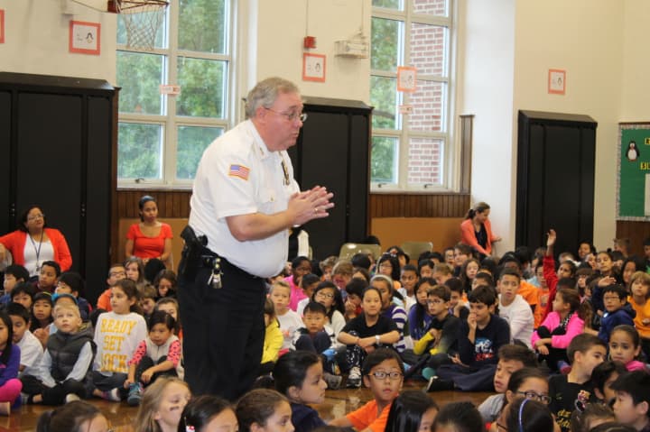 Police Chief Keith M. Bendul addresses students during the Cop Cards assembly at Fort Lee Elementary School No. 4 on Oct. 2.