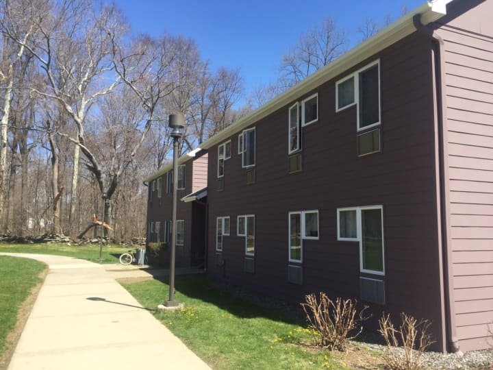 The SUNY Purchase College dormitory where an argument began during a barbecue party on Sunday. A suspect displayed a gun before running off into the woods, pursued by campus and Harrison police. A 24-year-old suspect was arrested on Monday night.
