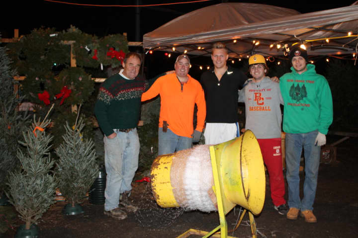 From left, Ron Miller, his son, Ryan, Erik Emerson, Michael Ippolito and Daniel Millan work a night shift at the sale in Closter. 