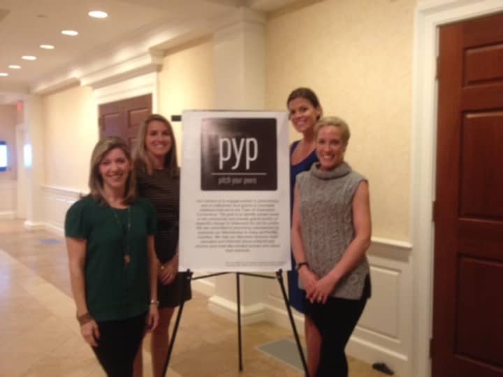 The four founders of Pitch Your Peers, from left, Rachel LeMasters, Dara Johnson, Brooke Bohnsack and Nina Lindia, welcome members to Pitch Night at First Presbyterian Church in Greenwich.