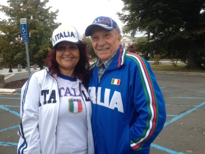 Rose Musolino, a club committee member and Felice Fiore, a club member for 60 years, wear their Italian pride for the flag raising in honor of Columbus Day at Danbury City Hall.