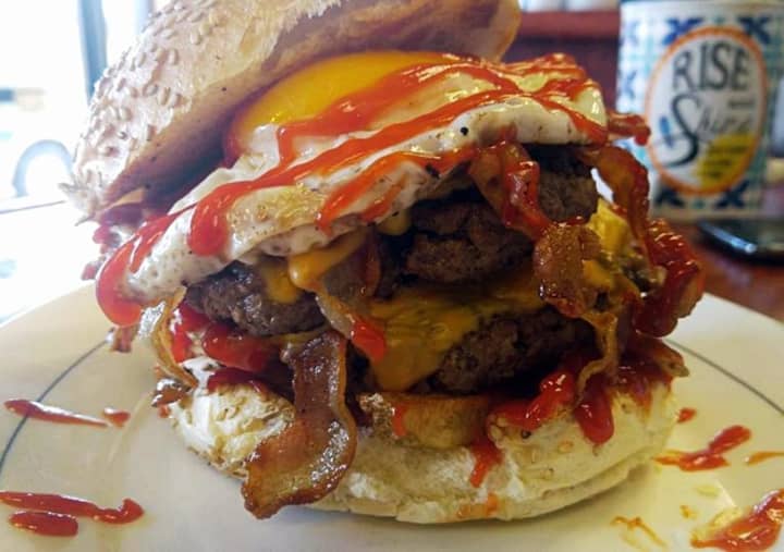 In a Yolko, ketchup garnishes the sunnyside-up egg that tops fries, a cheeseburger and bacon. It&#x27;s just one of the creations at Rony&#x27;s Rockin&#x27; Grill.