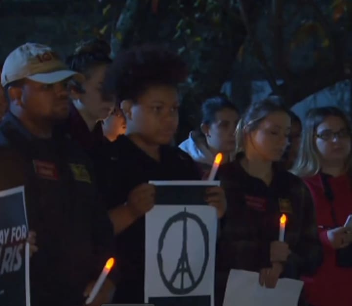 Students at Iona College gathered to honor victims of the Paris attacks. 