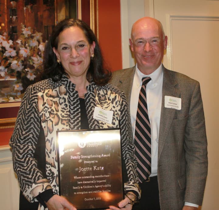 Joette Katz, Commissioner of the Connecticut Department of Children and Families, accepts the FCA Family Strengthening Award with FCA President &amp; CEO Robert F. Cashel.