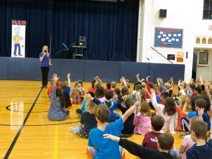 Kathryn Whisler, who is from &quot;The NED Show,&quot; speaks to Katonah Elementary School students.