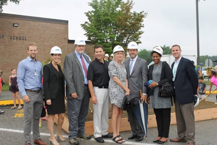 At the groundbreaking were KG+D Architects, PC representatives and school officials Timothy Conway, fourth from left; Valerie Henning-Piedmonte, schools superintendent, seventh from left; and Victor Karlsson, director of business services, far right.