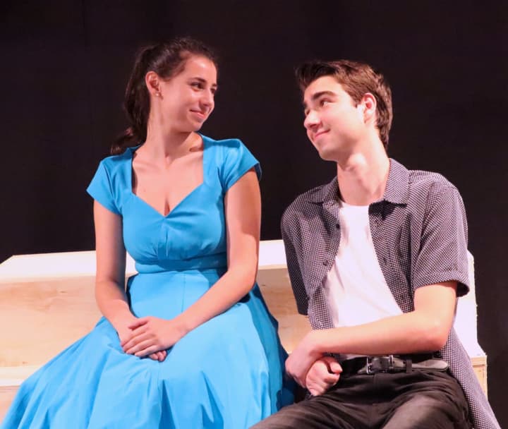 Kim Macafee, played by Julianna Goldfluss and Conrad Birdie  performed by Jayce Schwartz, get a brief moment alone in Curtain Call&#x27;s production of &quot;Bye, Bye, Birdie,&quot; playing at The Kweskin Theatre in Stamford from Aug. 2 through Aug. 11.