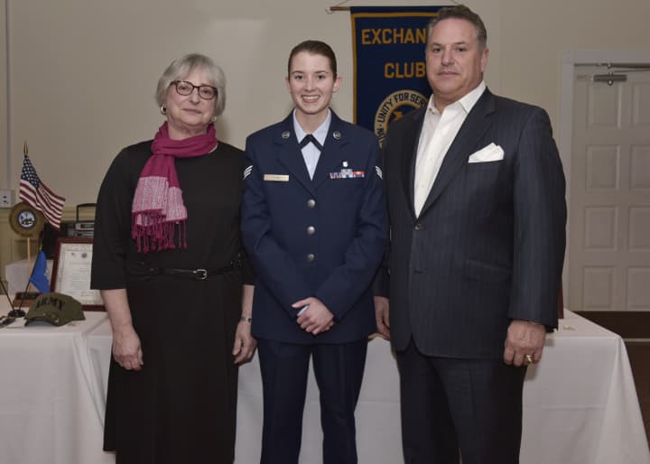 Senior Airman Kathleen Cass, center, is pictured at the Exchange Club of Danbury award ceremony with the sponsors of the scholarship she received, Marie and Alan Guarino.