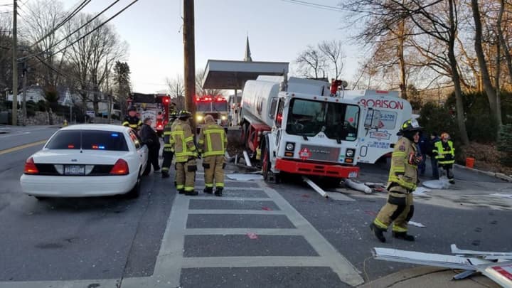 Mount Kisco firefighters respond to a heating-oil truck&#x27;s spill at Route 117 and Gregory Avenue.