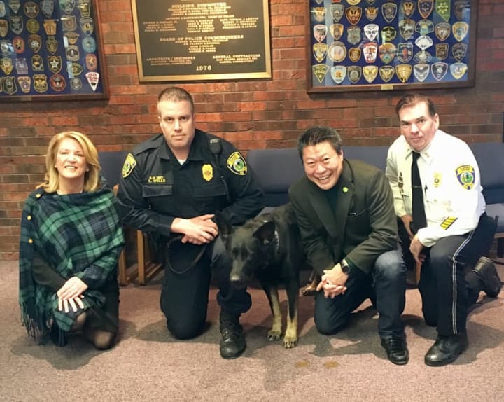 State Rep. Brenda Kupchick (R-132), Fairfield Police Officer Kevin Wells with K9 Officer Jagger, Fairfield Police Chief Gary MacNamara and Sen. Tony Hwang (R-28). The legislators support a bill to enhance criminal penalties to protect police dogs.