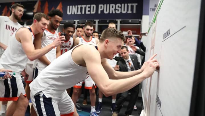 Former Westchester high school basketball standout Ty Jerome, shown standing in the center behind teammate Kyle Guy (front), and the Virginia Cavaliers will take their shot at the NCAA Tournament on Monday night.