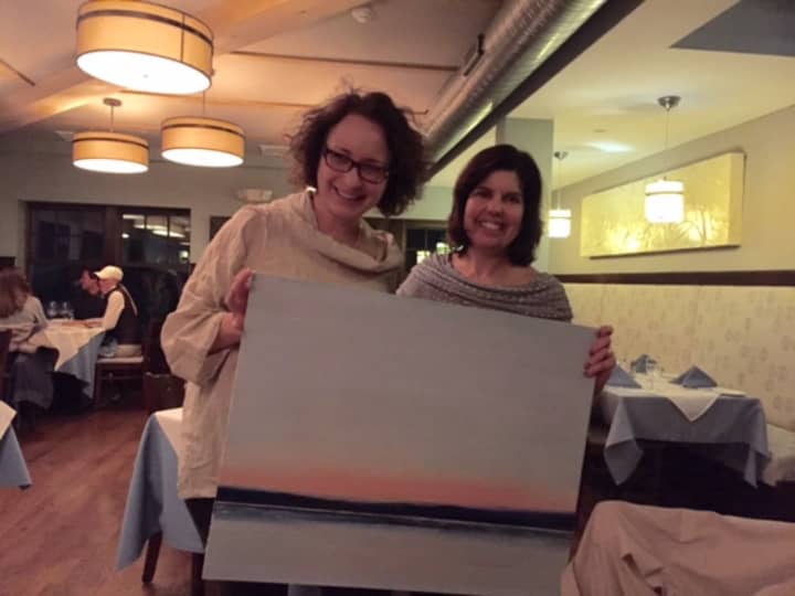 Sharon Hyde was the winner of Rachel Volpone’s painting “Sea Blue,” valued at more than $2,000 and created in honor of Volpone’s grandfather, whom she remembered for driving senior voters to the polls.