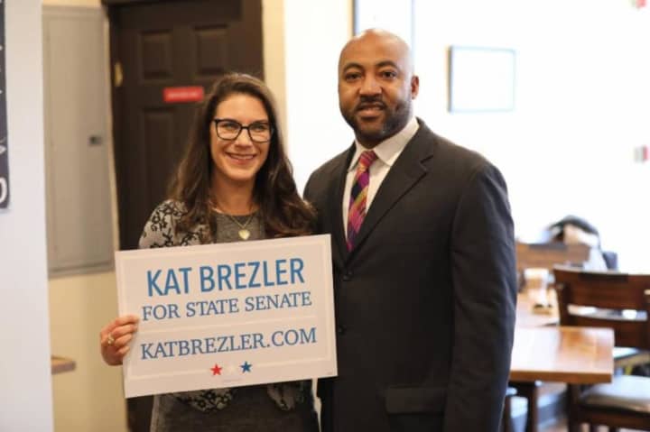 Kat Brezler stands with New Rochelle Councilman Jared Rice following the announcement of her candidacy for State Senate.