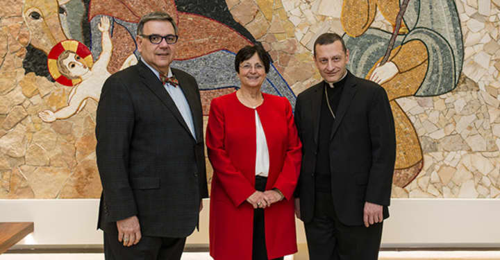 From left are Sacred Heart University President John Petillo, Catholic Studies Chair Michelle Loris and Bishop Frank Caggiano in the Chapel of the Nativity.