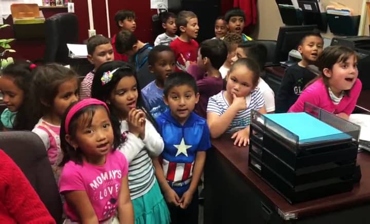 Kindergartners from Lincoln sang their school song at the Bergenfield Police Department.