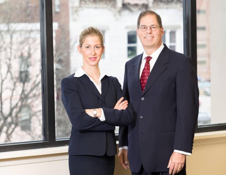 Lindsey Goldstein, left, and her father, Paul, run a personal injury law practice in Poughkeepsie. The younger Goldstein says she knew she would pursue a career in the law even when she was little.