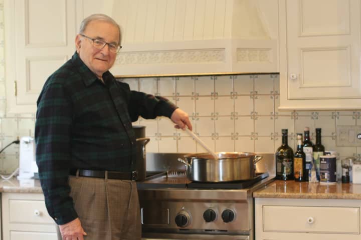 Cookbook Author Anthony LoFrisco stirs up some of his favorites at his Wilton home.