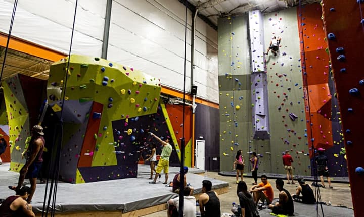 Locals are invited to come enjoy wine and cheese -- and climbing -- at High Exposure, at twice-weekly meetups.