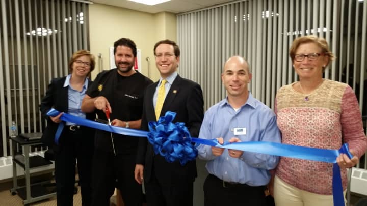 Mount Kisco Medical &amp; Injury Care ribbon cutting. Shown left to right are Dr. Louis Campbell, New York State Assemblyman David Buchwald (D-White Plains) and Mt. Kisco Chamber President Dan Taplitz