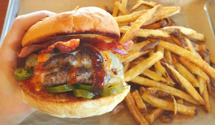 A Mooyah Burger with jalapenos and bacon.