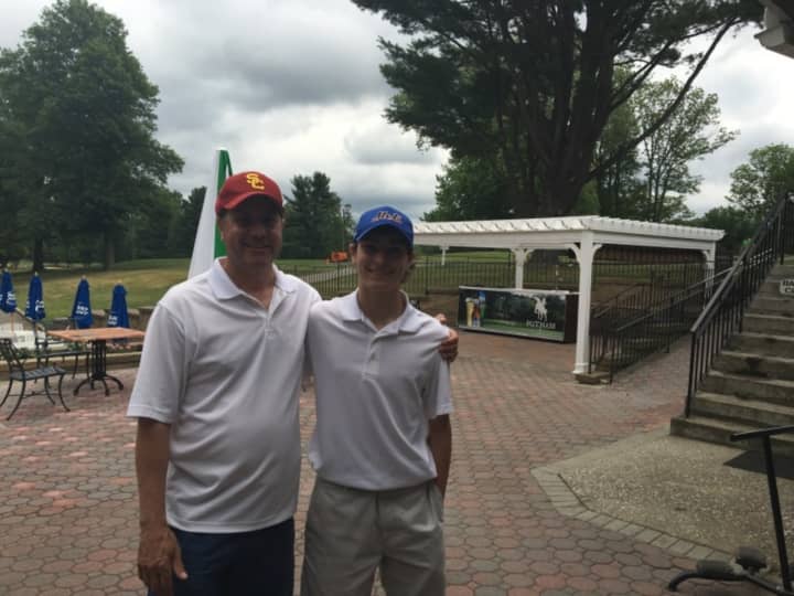 Matthew DeRosa and his dad at the Putnam County Golf Course after Matthew&#x27;s hole-in-one.