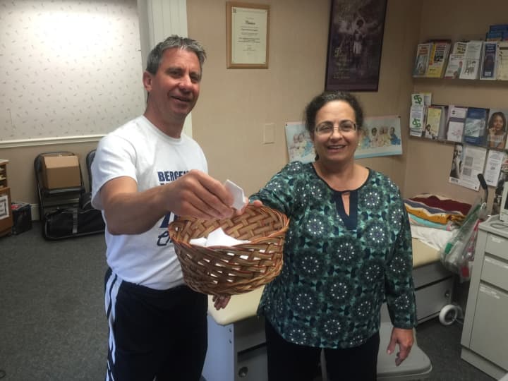 Bergenfield Mayor Norman Schmelz picks raffle winners at the conclusion of the Mayors Wellness Challenge.