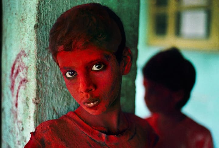 Steve McCurry&#x27;s &quot;Red Boy&quot; will be on display at Housatonic Community College.