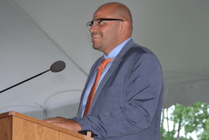 Horace Greeley High School Assistant Principal Michael Taylor, pictured speaking at the school&#x27;s 2014 graduation.