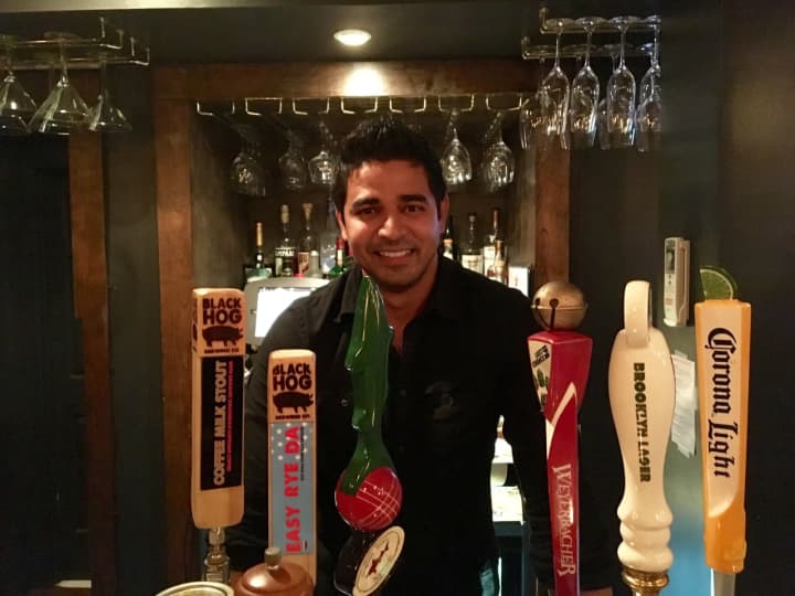 Milburn, the bartender at INDIA in New Canaan.