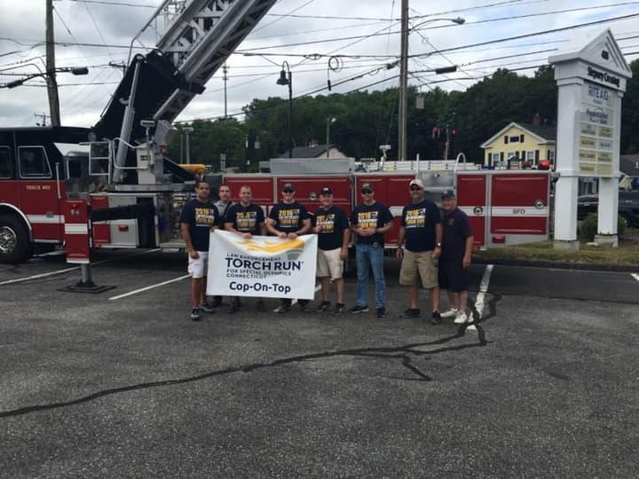 Members of the Monroe Police Department participated in a Torch Run for Special Olympics Connecticut.