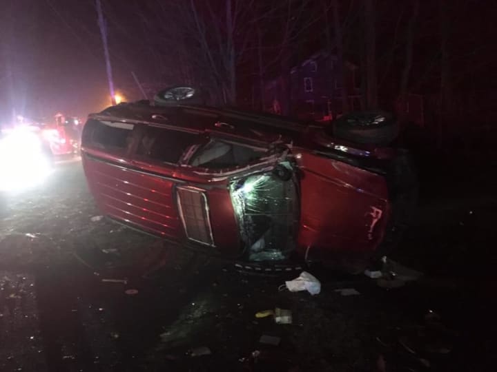 The occupants of this one-car roll-over crash on Elm Street in Monroe escaped without injury early Sunday, fire and police officials said.