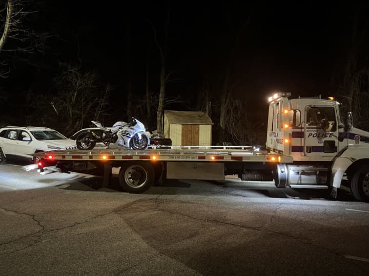 Suffolk County Police released a photo of the motorcycle on a tow truck after the alleged drag racing incident.&nbsp;