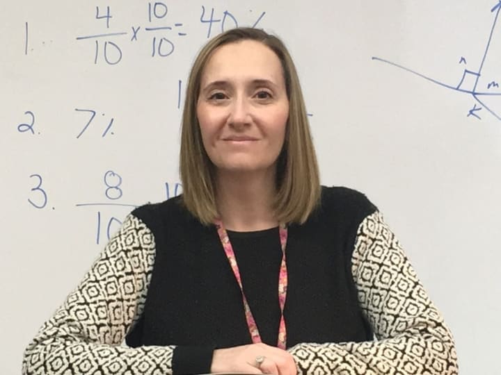 Thea Unagast has been named a &quot;Teacher Who Rocks&quot; by WDHA.